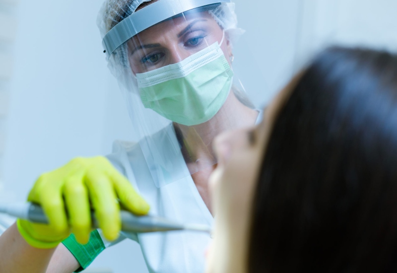 Women dentist checking patient at Hawthorne, CA